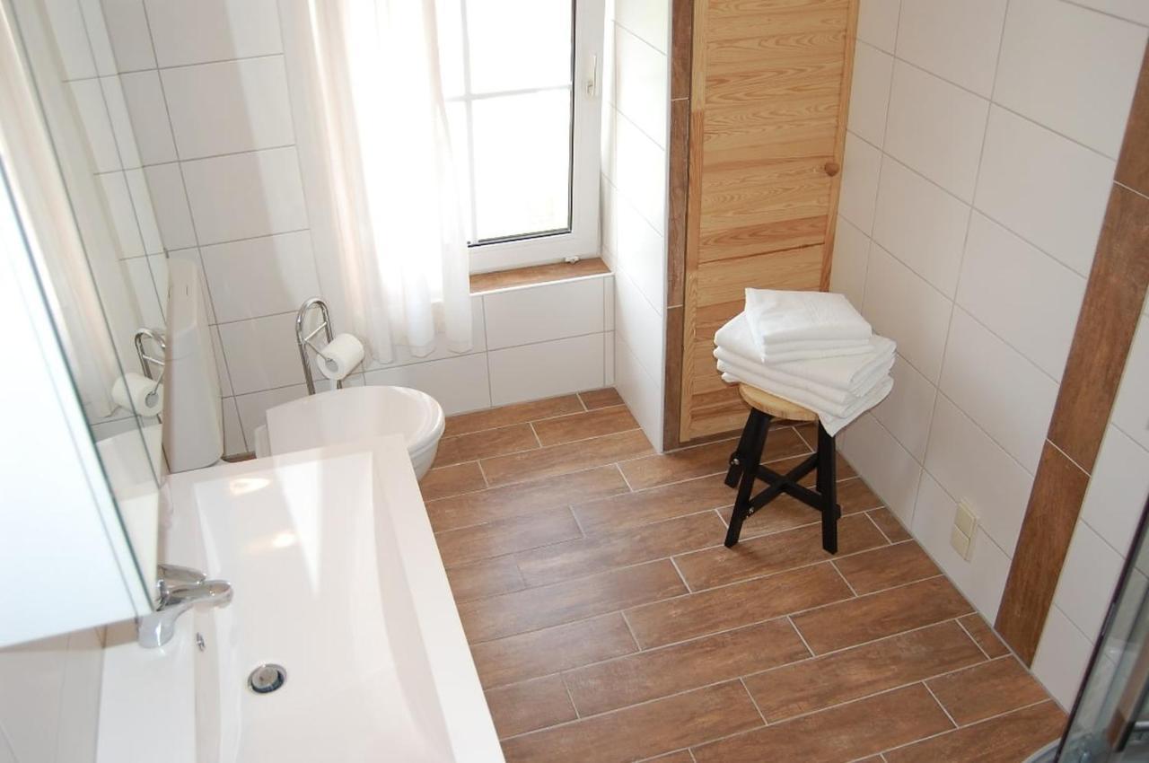 Ferienwohnung Im Gulfhof Krummhörn Exteriör bild